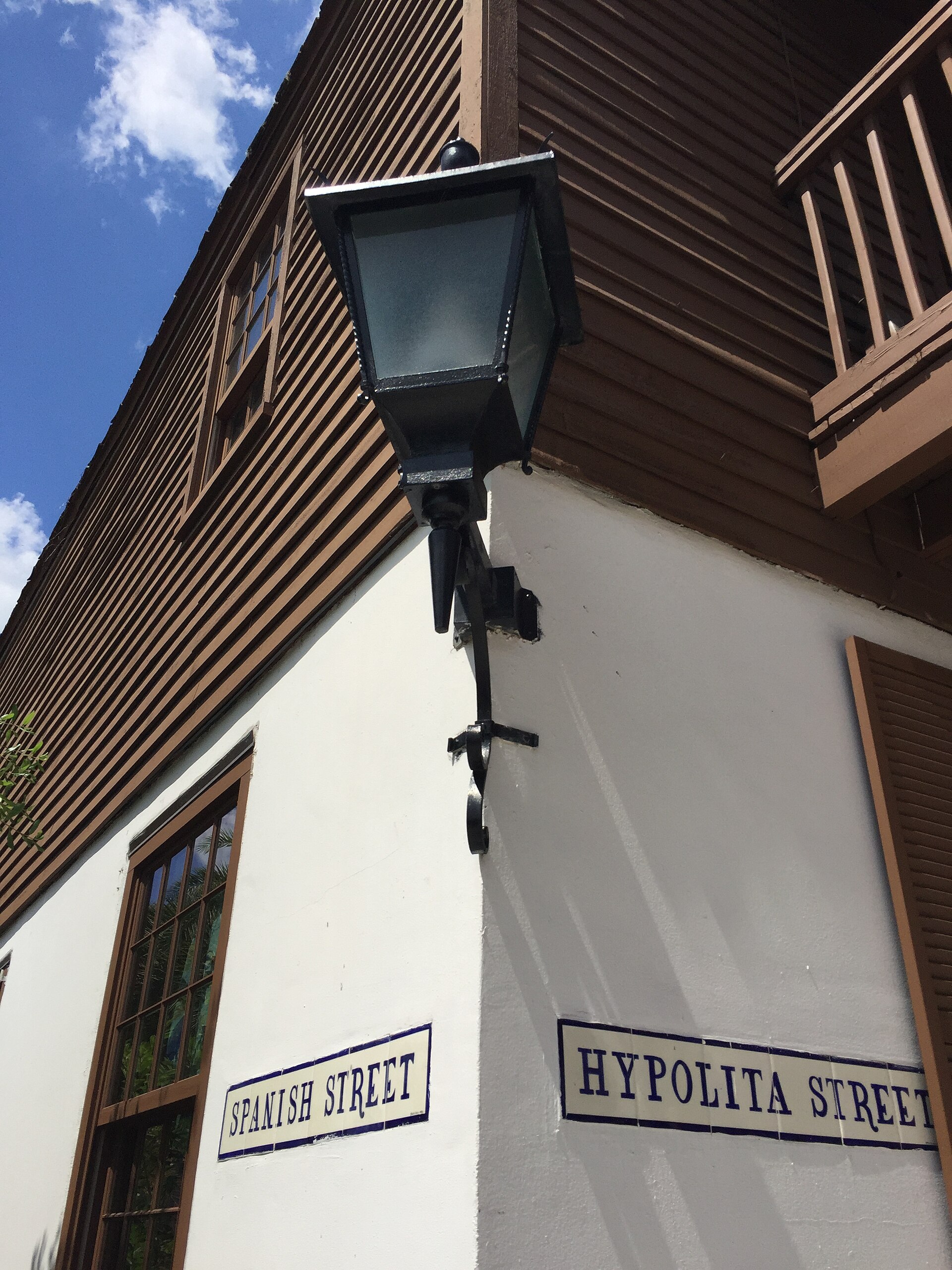 A lantern-lit corner on Spanish Street in the Colonial Quarter